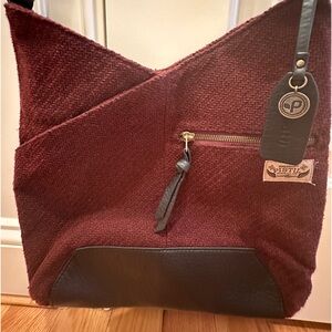 Pistil crossbody cranberry herringbone pattern Oregon- new w/o tags.